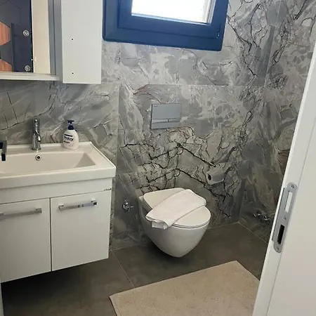 Apartment Ozy / Andifli Kas